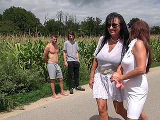 Gung-ho matures Emily Devine together with Lilian Funereal acquire fucked outdoors